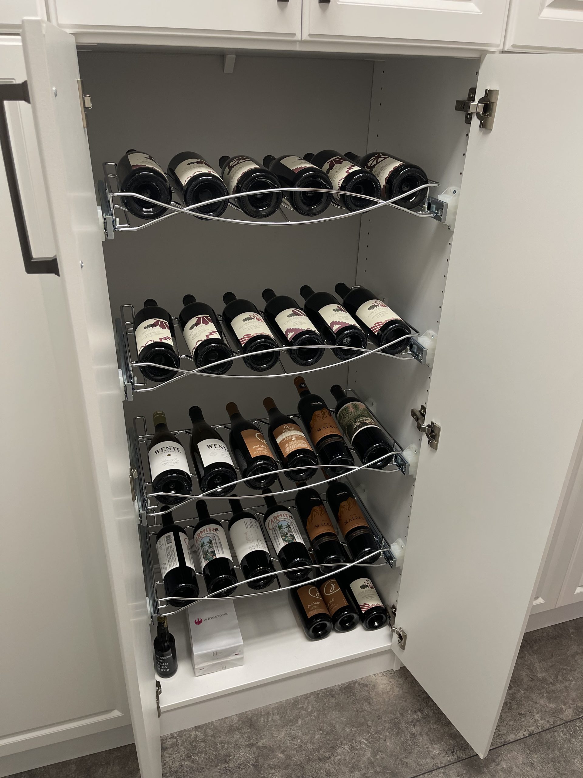 Reach-in pantry storage by The Closet Rehab