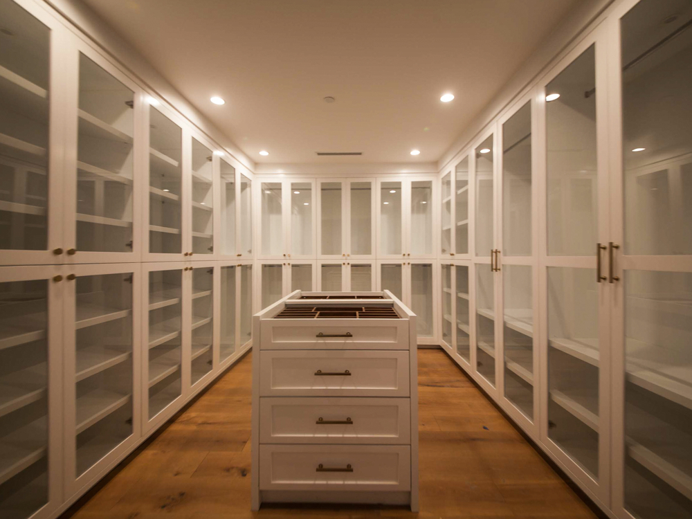 Organized custom walk-in closet